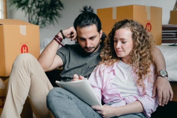 Couple looking at paperwork for financial future